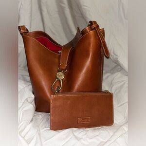 Dooney and Bourke logo lock Toscana leather Lily bucket shoulder bag